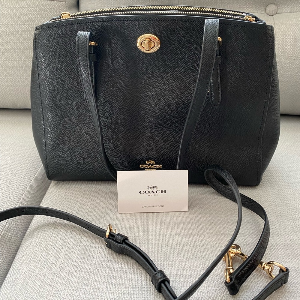 Black Leather Coach Handbag with Gold Accents